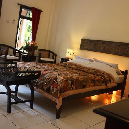 Rambutan Boutique Hotel Lovina Beach Extérieur photo