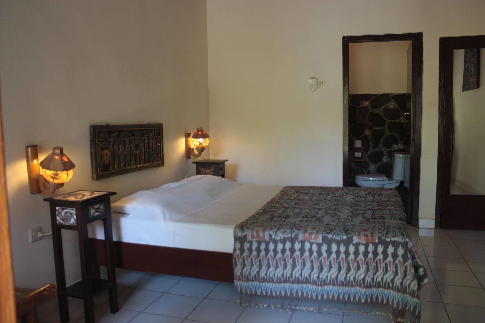 Rambutan Boutique Hotel Lovina Beach Extérieur photo