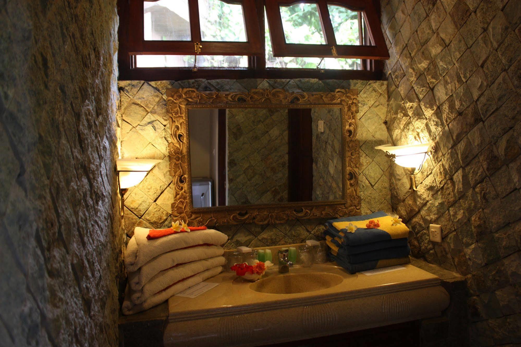 Rambutan Boutique Hotel Lovina Beach Extérieur photo